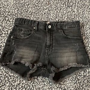 H and M black distressed jean shorts.